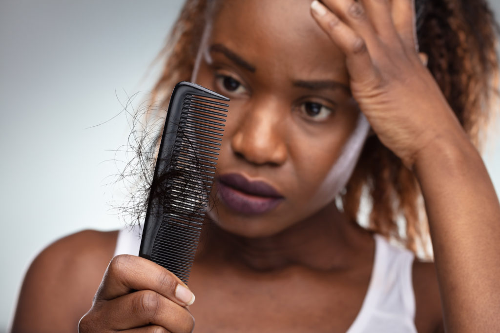 Woman Suffering From Hair Loss
